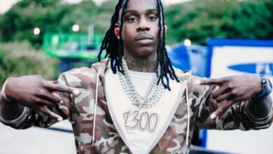 Polo G confidently walks down the street without security.