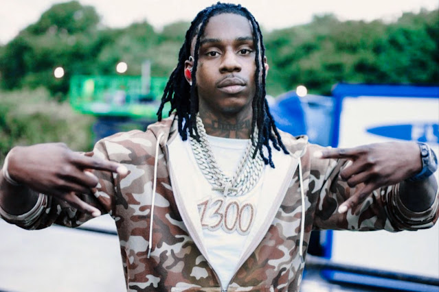 Polo G confidently walks down the street without security.