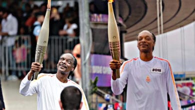 Snoop Dogg Carries the Olympic Torch Ahead of Paris Opening Ceremony Snoop Dogg Shines as Final Torch Bearer in Paris